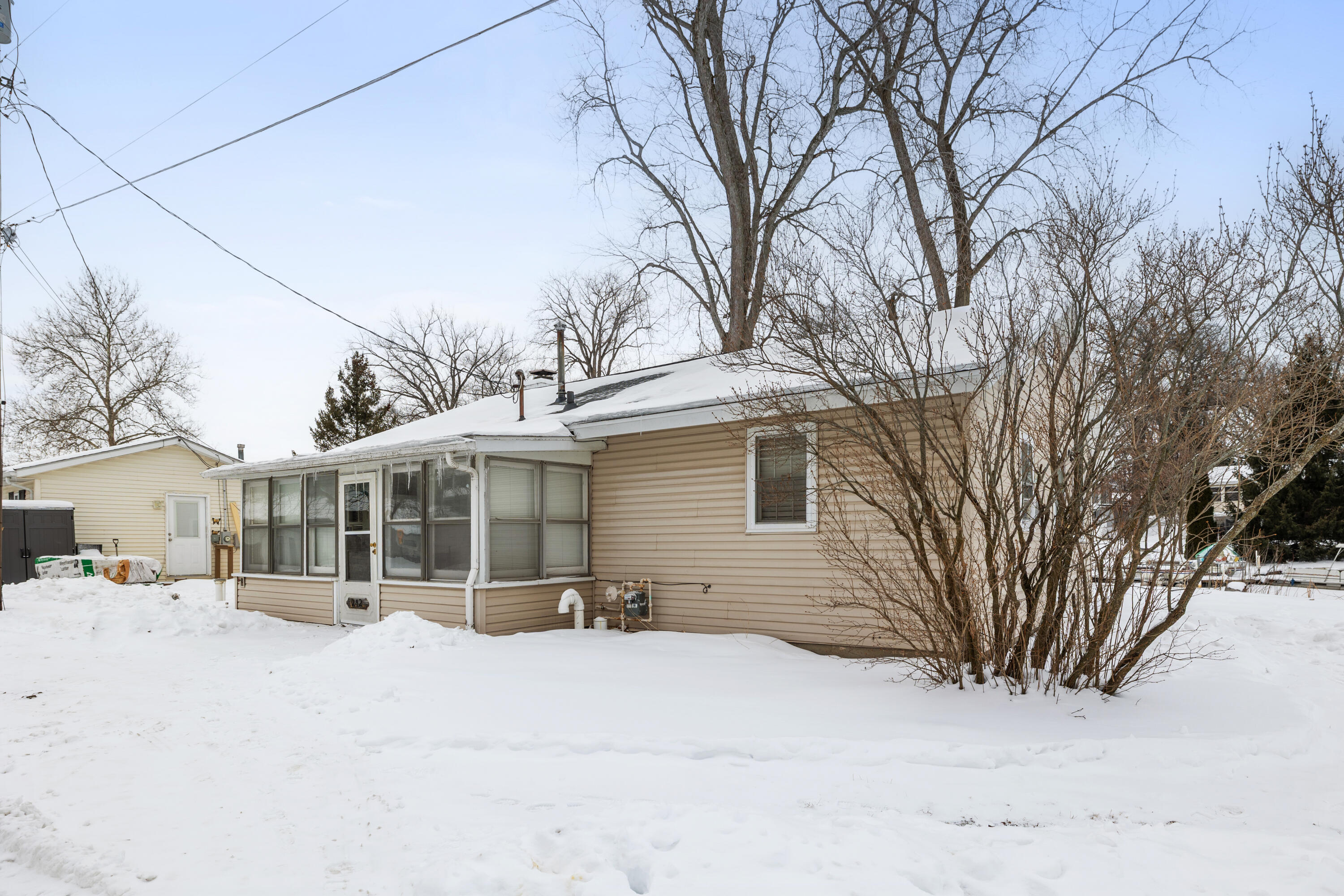 292 Grayson Road La Porte, IN 46350 - Photo 13 of 27 a view of a house with snow on the road