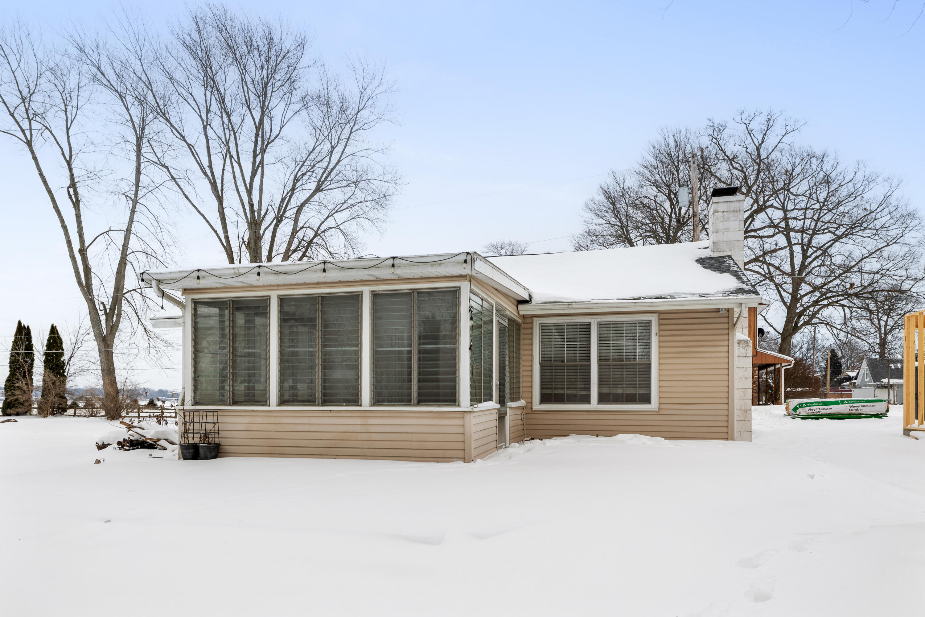 292 Grayson Road La Porte, IN 46350 - Photo 15 of 27 a view of house with a yard covered in snow