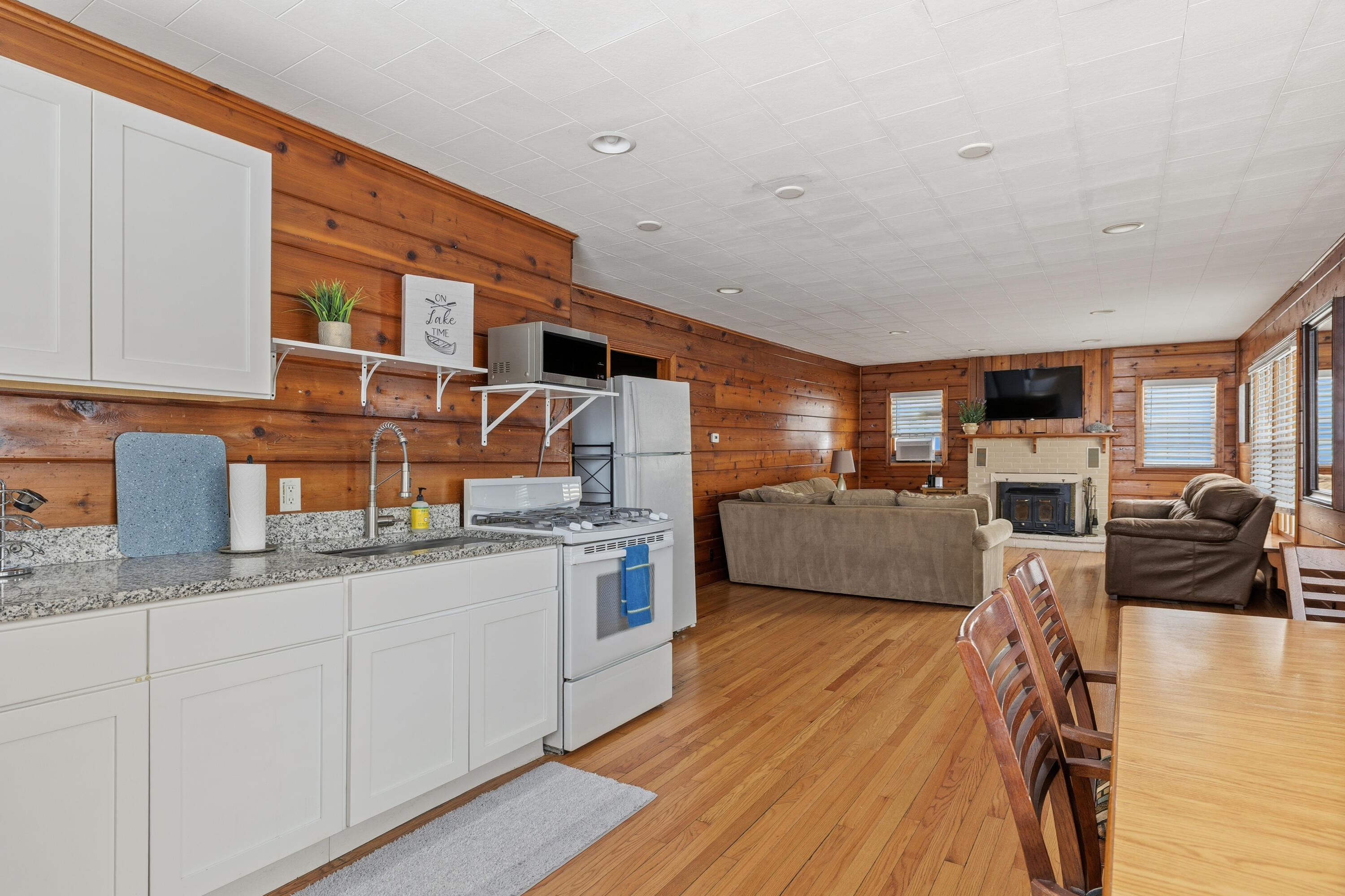 292 Grayson Road La Porte, IN 46350 - Photo 17 of 27 a kitchen with granite countertop lots of counter top space and stainless steel appliances