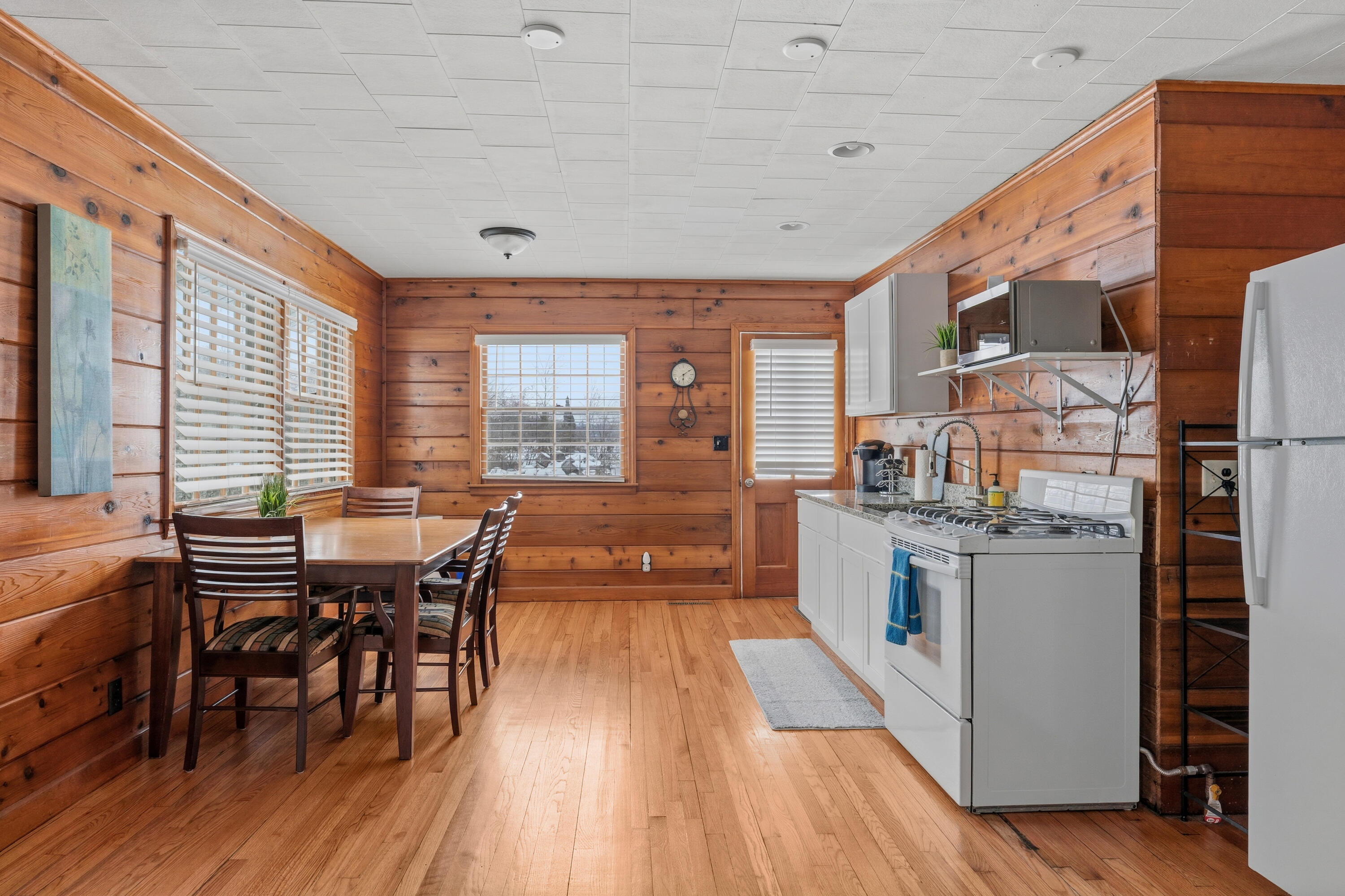 292 Grayson Road La Porte, IN 46350 - Photo 19 of 27 a large kitchen with a table and chairs