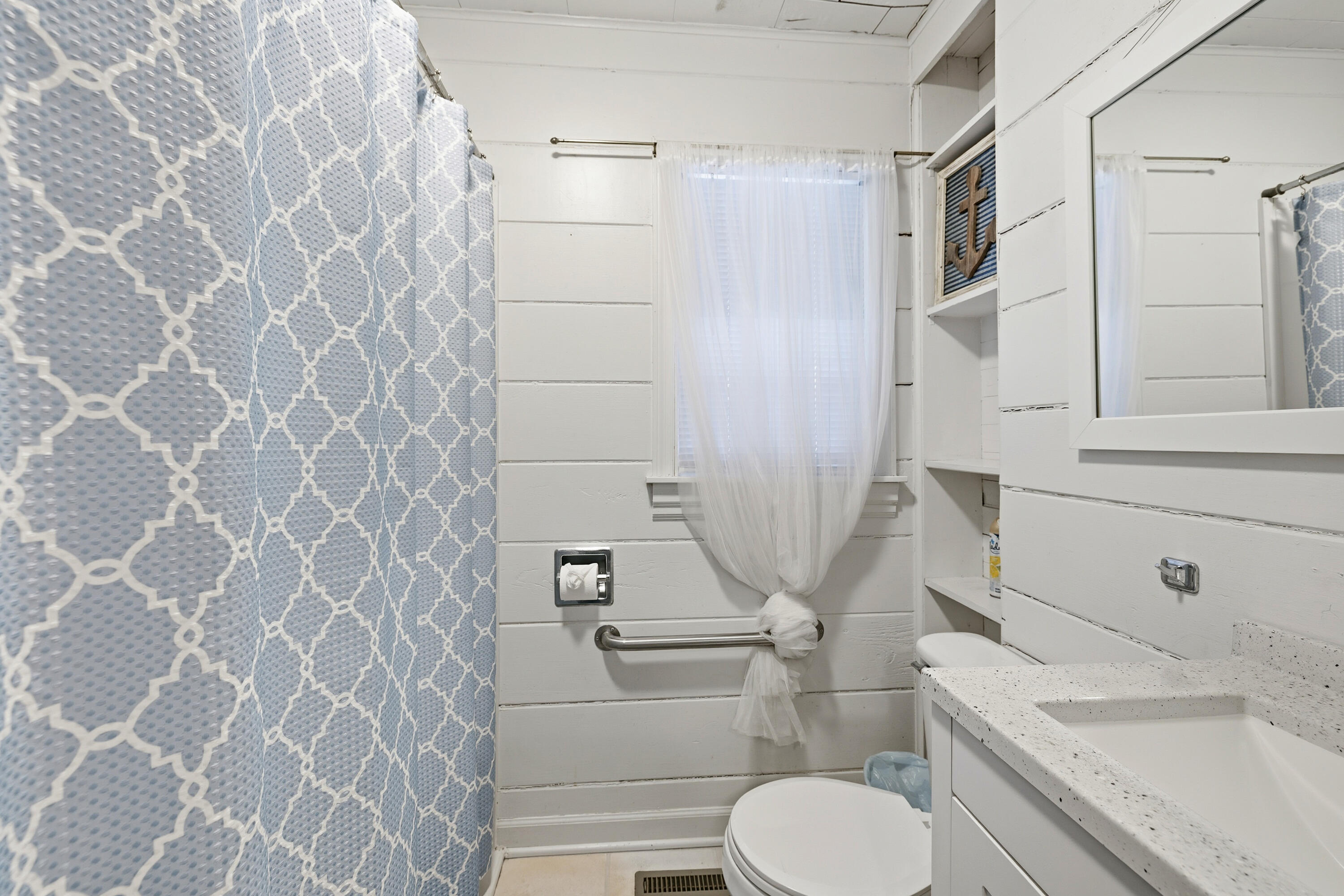 292 Grayson Road La Porte, IN 46350 - Photo 22 of 27 a bathroom with a sink toilet and shower