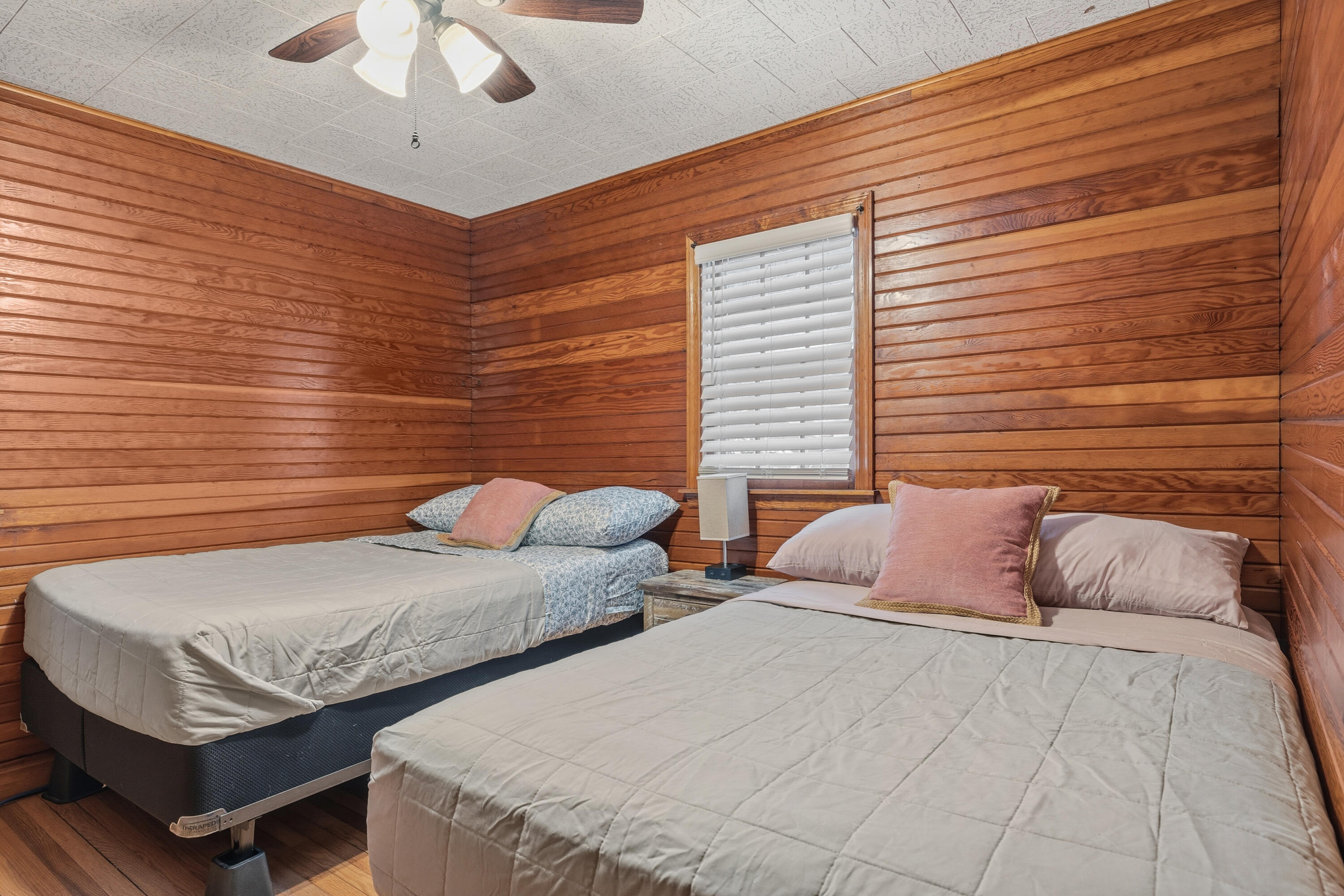 292 Grayson Road La Porte, IN 46350 - Photo 23 of 27 a bedroom with two beds and chandelier