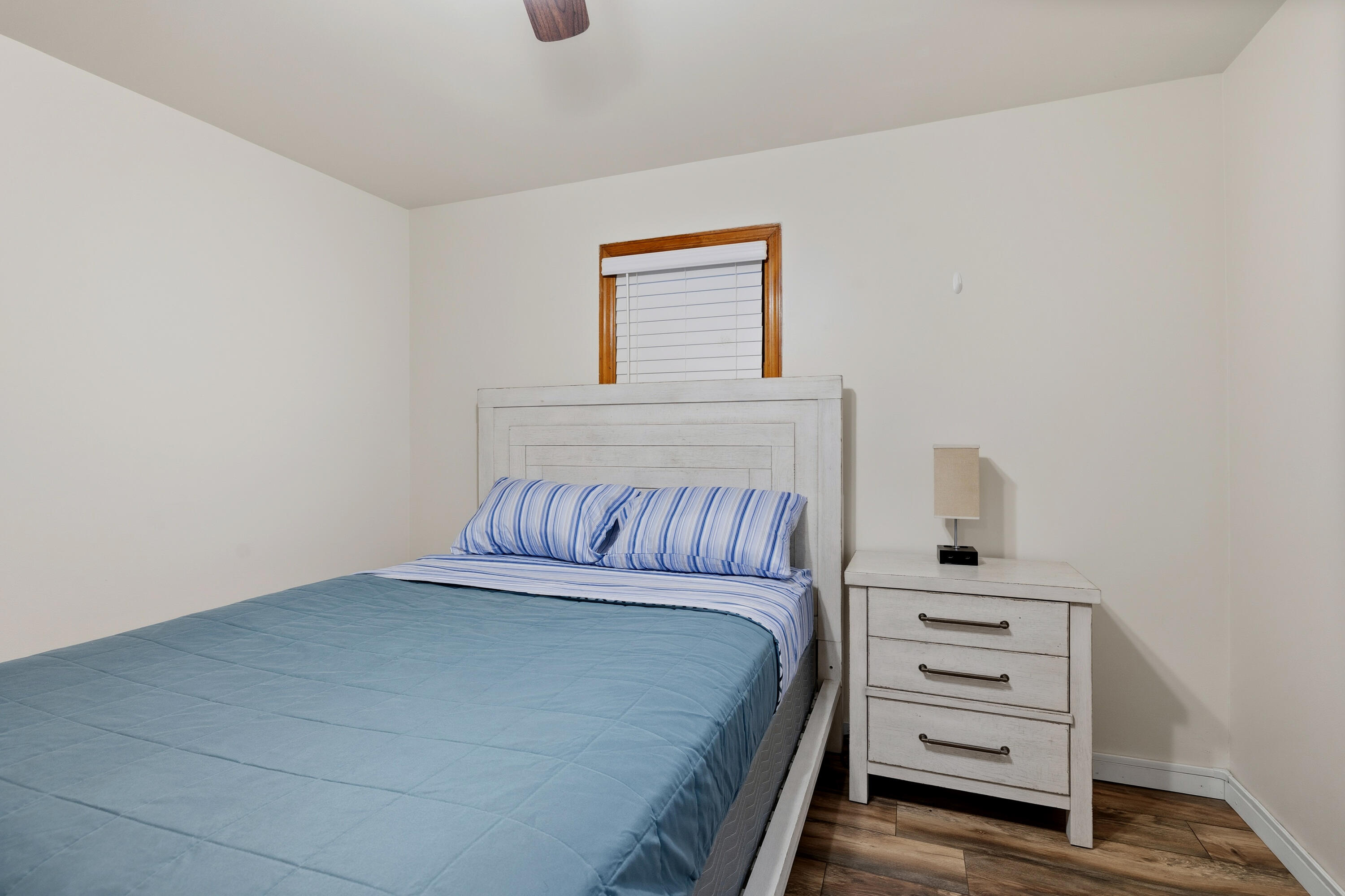 292 Grayson Road La Porte, IN 46350 - Photo 24 of 27 a bedroom with a bed and a cabinets