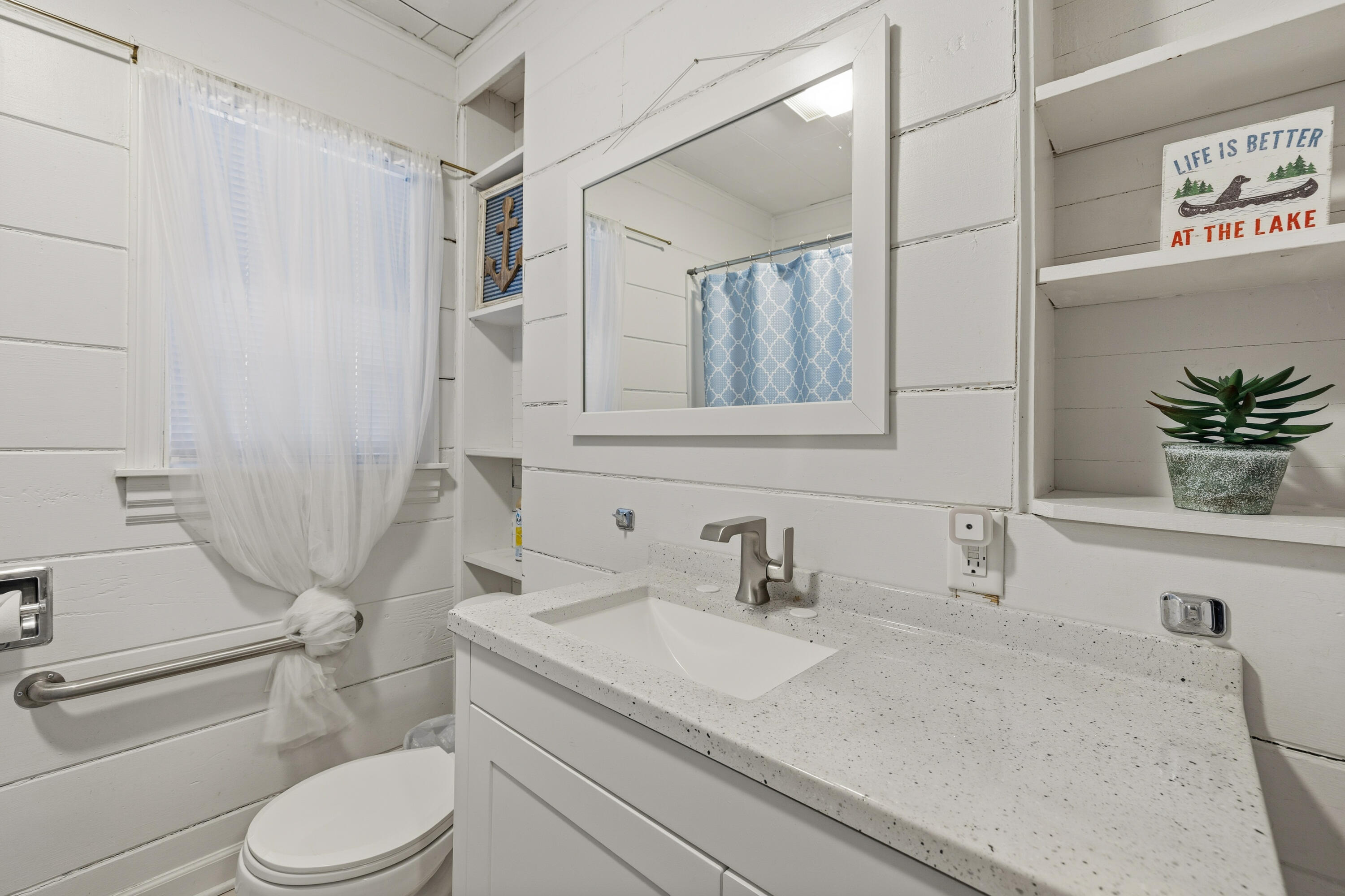 292 Grayson Road La Porte, IN 46350 - Photo 6 of 27 a bathroom with a sink a toilet and shower