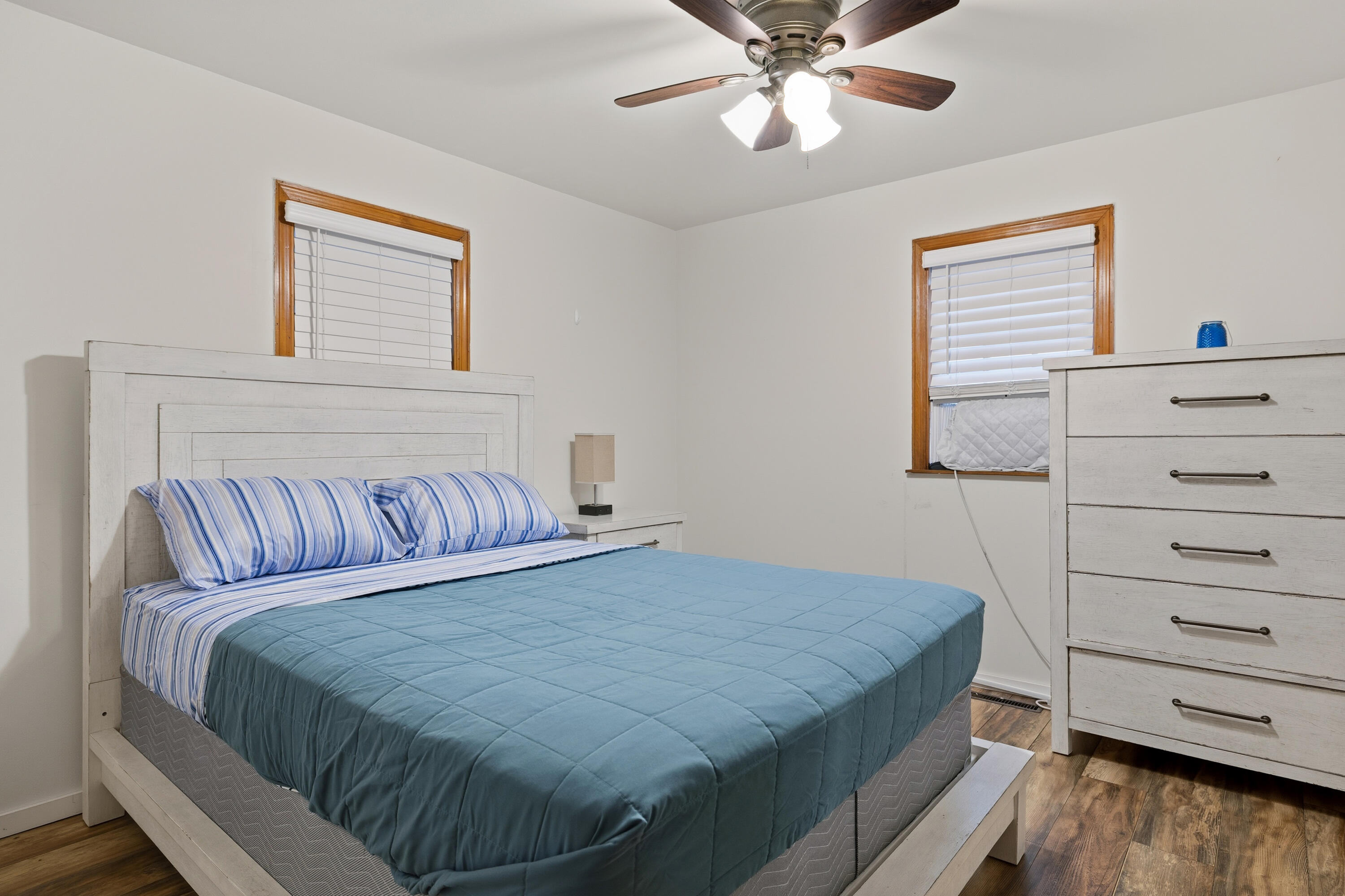 292 Grayson Road La Porte, IN 46350 - Photo 8 of 27 a bedroom with a large bed and a dresser