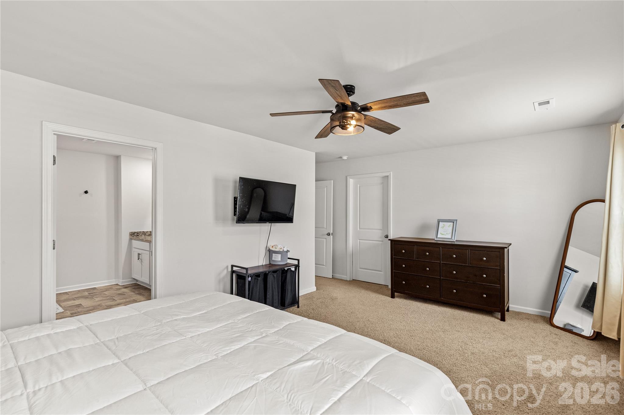 559 King Clover Lane Clover, SC 29710 - Photo 16 of 34 a bedroom with a bed and a flat screen tv