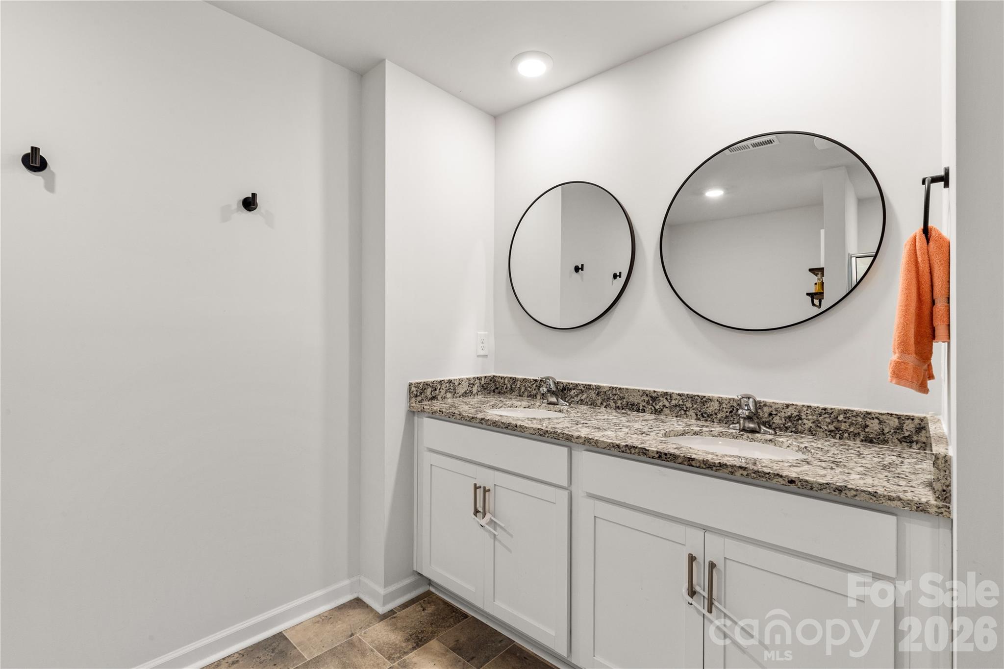 559 King Clover Lane Clover, SC 29710 - Photo 18 of 34 a bathroom with a granite countertop double vanity sink and mirror