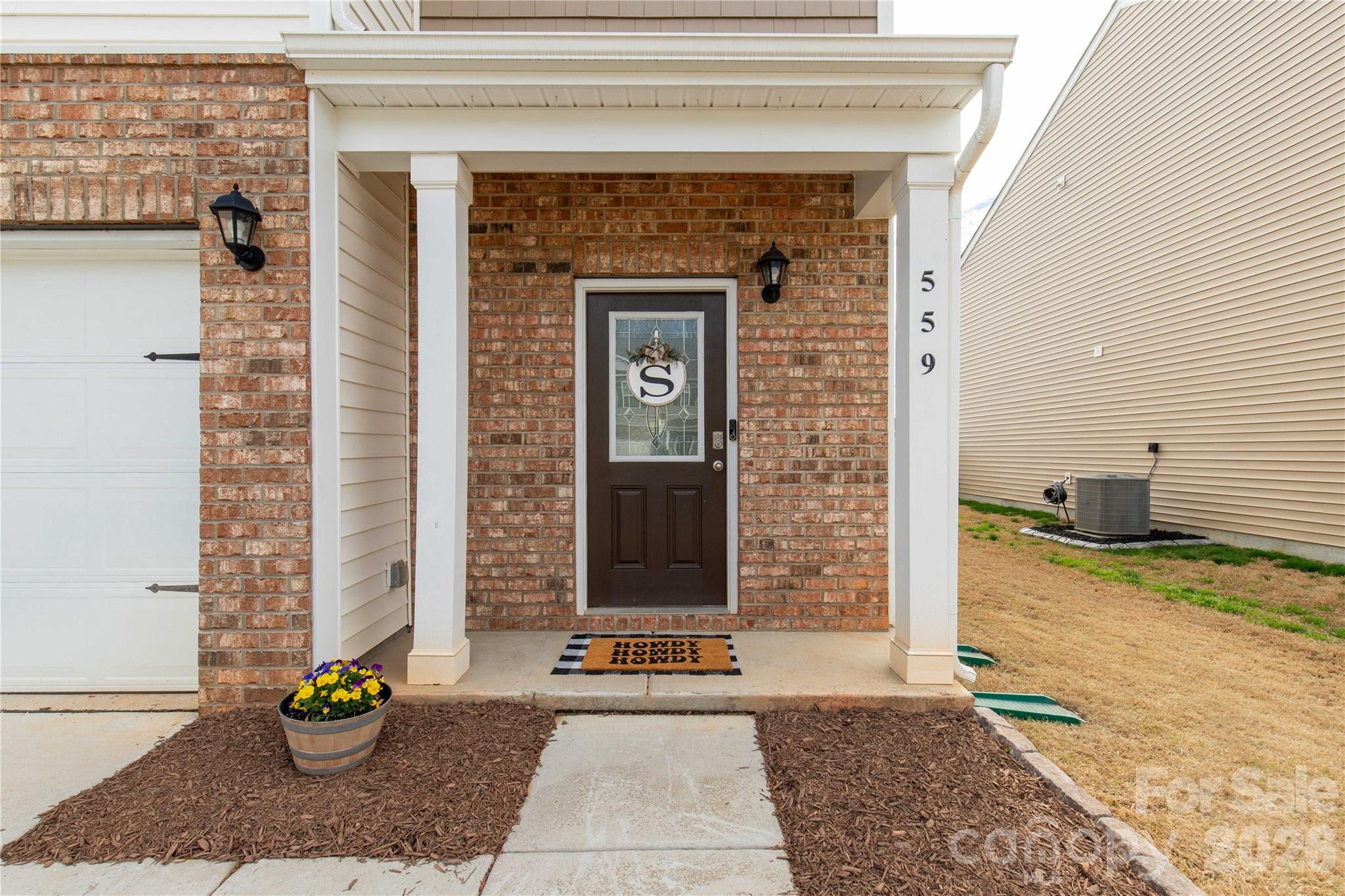 559 King Clover Lane Clover, SC 29710 - Photo 2 of 34 a view of a entryway door front of a house