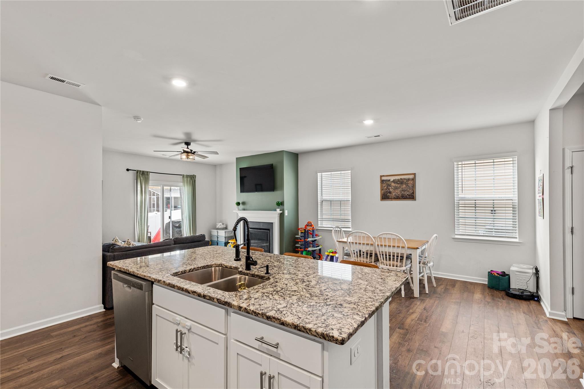 559 King Clover Lane Clover, SC 29710 - Photo 8 of 34 a kitchen with granite countertop a sink and a stove top oven