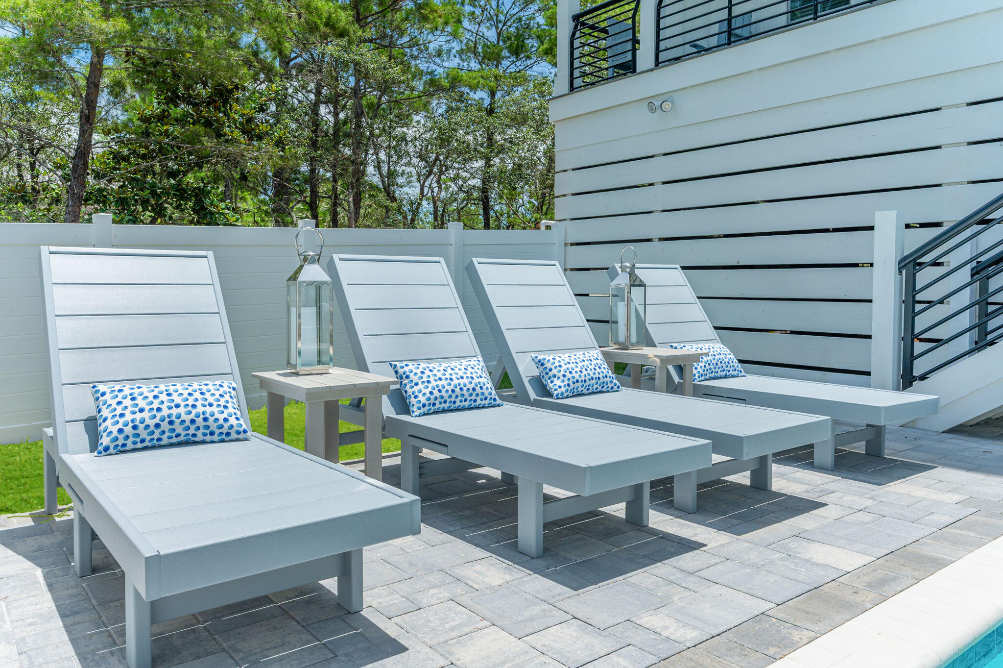 6508 West County Highway 30A Santa Rosa Beach, FL 32459 - Photo 17 of 75 a view of a patio with a table and chairs
