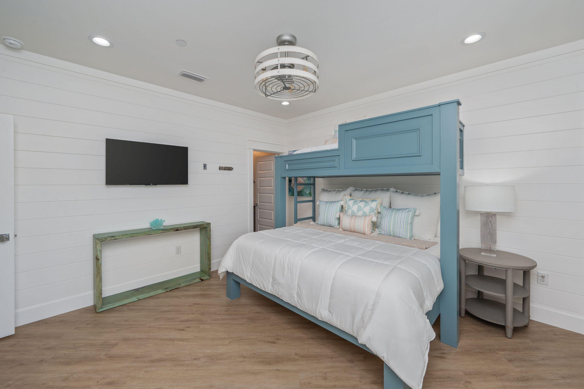 6508 West County Highway 30A Santa Rosa Beach, FL 32459 - Photo 35 of 75 a bedroom with a bed and a chandelier
