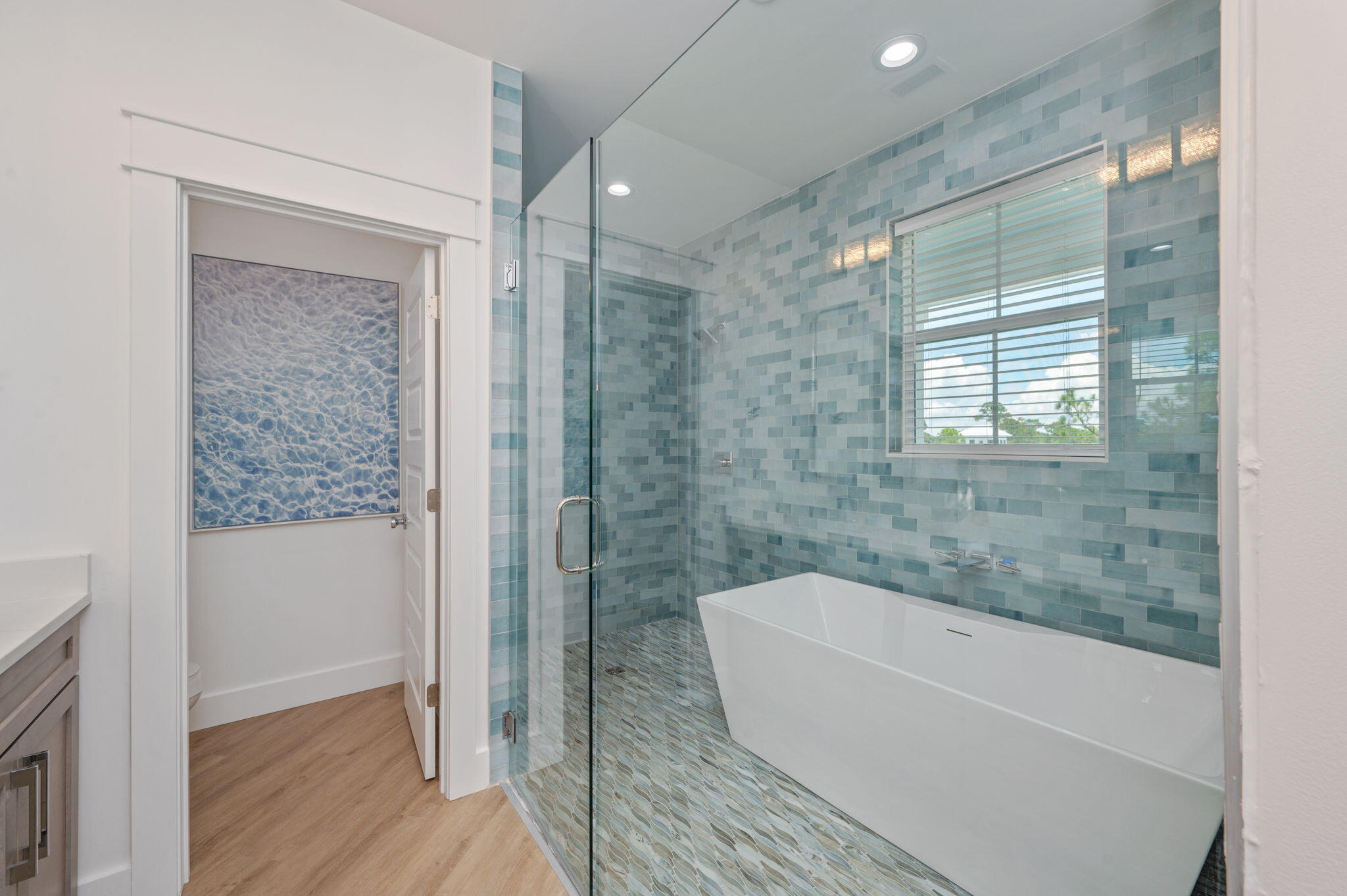 6508 West County Highway 30A Santa Rosa Beach, FL 32459 - Photo 52 of 75 a bathroom with a bathtub and a shower