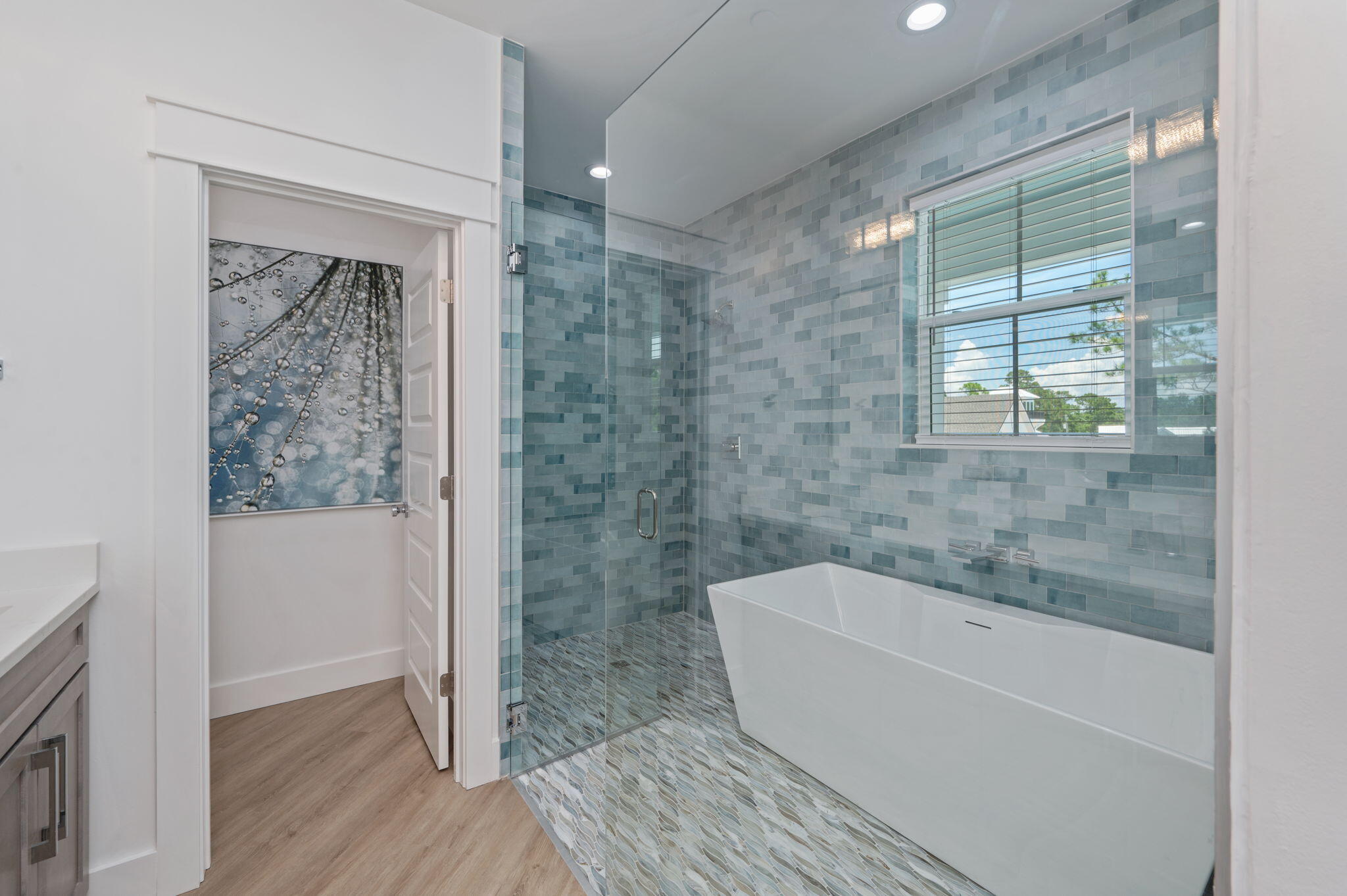 6508 West County Highway 30A Santa Rosa Beach, FL 32459 - Photo 53 of 75 a bathroom with a bathtub a toilet and a shower