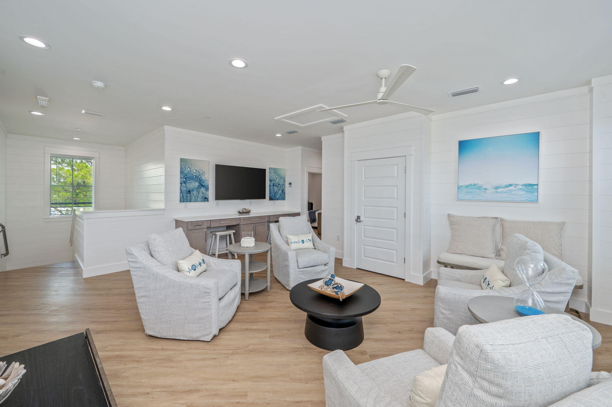 6508 West County Highway 30A Santa Rosa Beach, FL 32459 - Photo 67 of 75 a living room with furniture and a flat screen tv