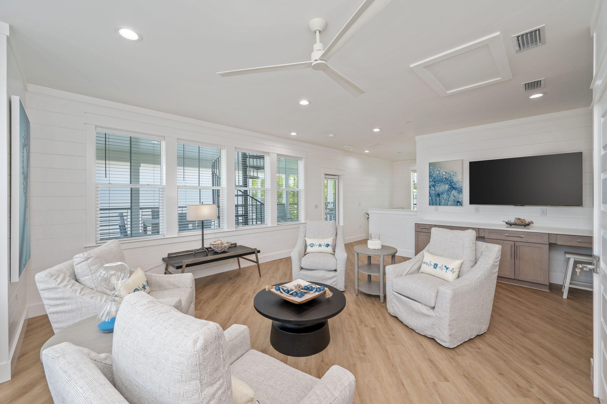 6508 West County Highway 30A Santa Rosa Beach, FL 32459 - Photo 68 of 75 a living room with furniture and a flat screen tv