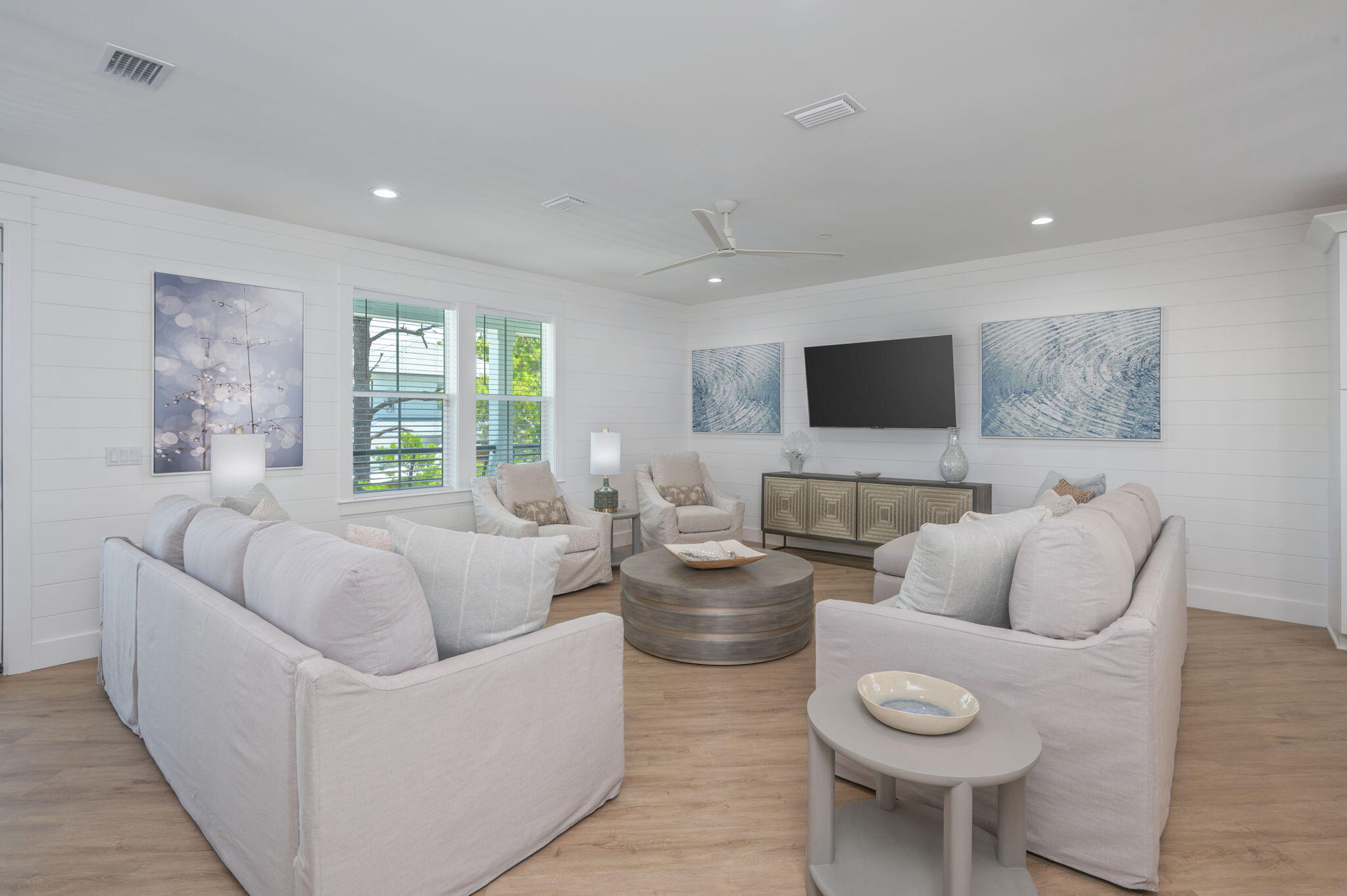6508 West County Highway 30A Santa Rosa Beach, FL 32459 - Photo 7 of 75 a living room with furniture and a flat screen tv