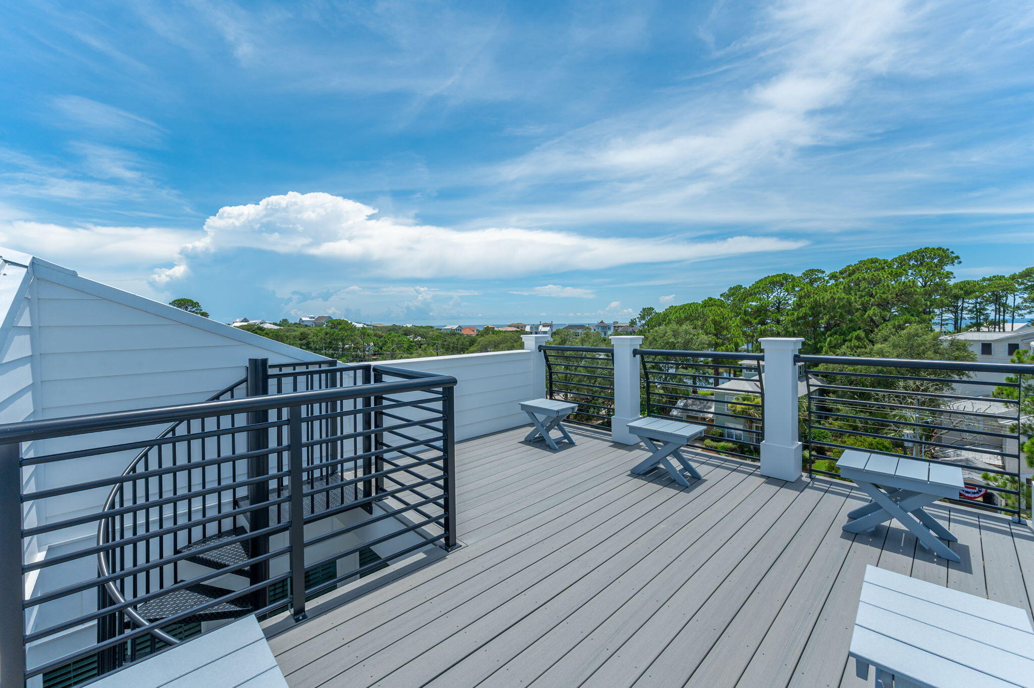6508 West County Highway 30A Santa Rosa Beach, FL 32459 - Photo 73 of 75 a view of roof deck with wooden floor and fence