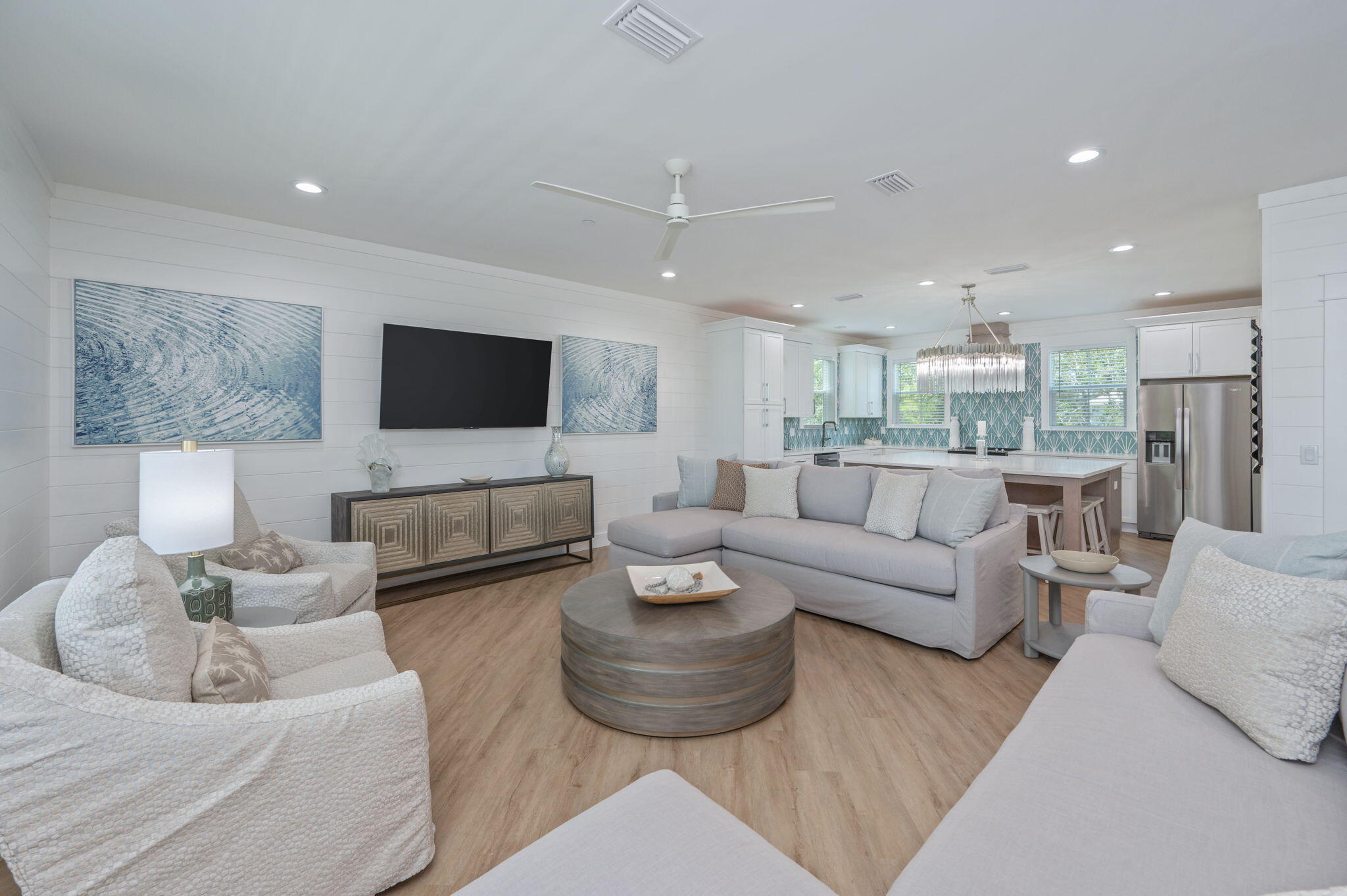 6508 West County Highway 30A Santa Rosa Beach, FL 32459 - Photo 8 of 75 a living room with furniture and a flat screen tv