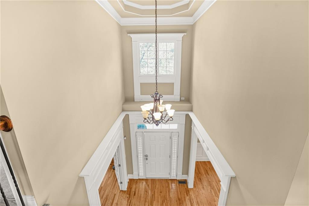 955 Gardiner Circle Suwanee, GA 30024 - Photo 18 of 44 a view of a hallway with windows