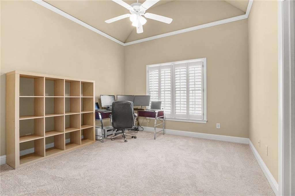 955 Gardiner Circle Suwanee, GA 30024 - Photo 32 of 44 a view of a workspace with furniture and a window