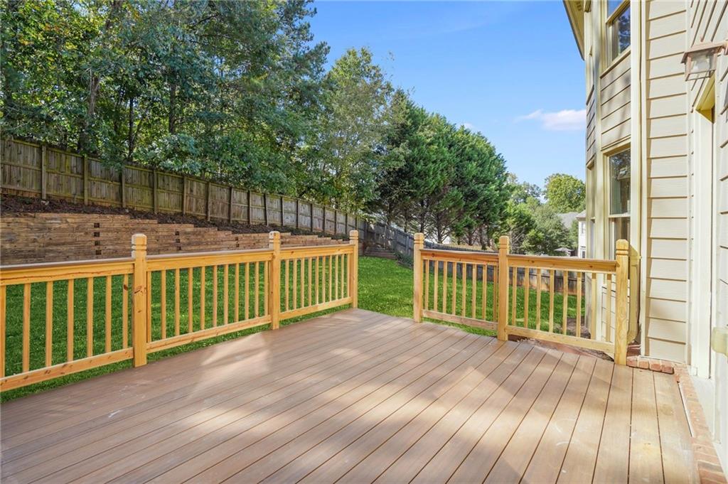 955 Gardiner Circle Suwanee, GA 30024 - Photo 39 of 44 a view of a wooden deck
