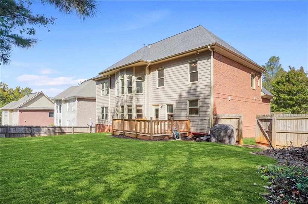955 Gardiner Circle Suwanee, GA 30024 - Photo 41 of 44 a front view of house with yard