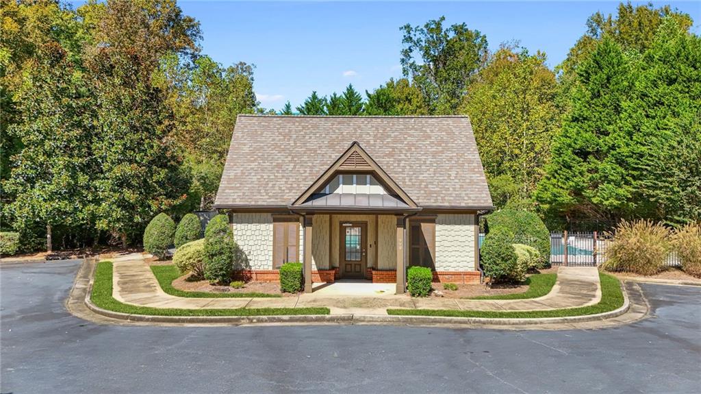 955 Gardiner Circle Suwanee, GA 30024 - Photo 43 of 44 a house view with a outdoor space