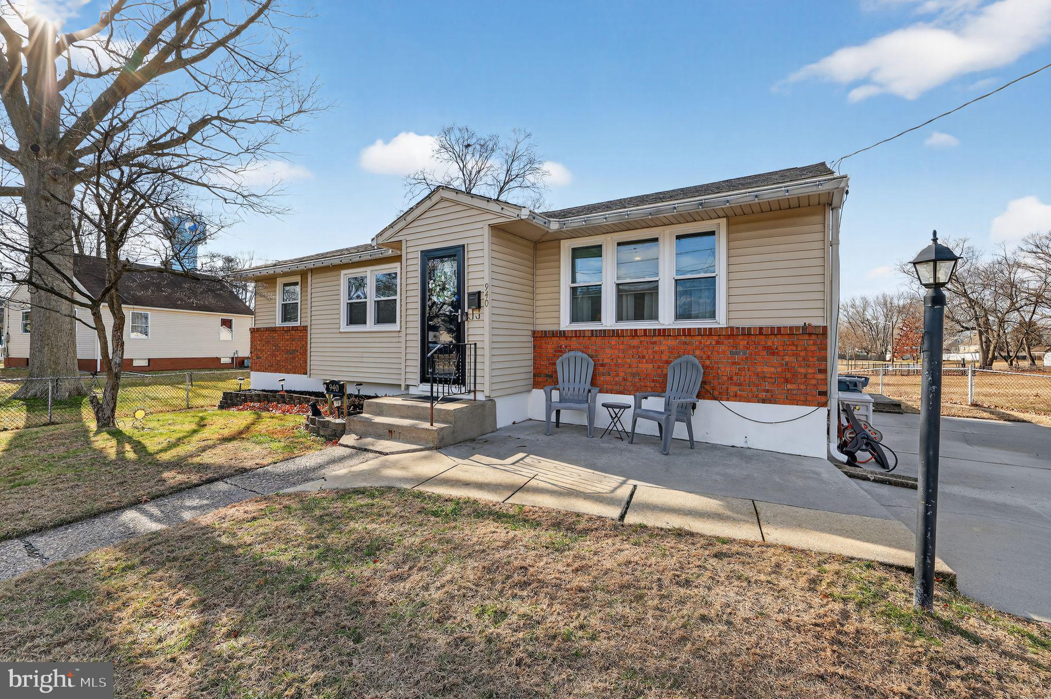 940 Carter Avenue Bellmawr, NJ 08031 - Photo 3 of 33 a view of a house with backyard porch and sitting area