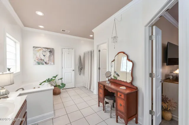 a room with furniture and a mirror