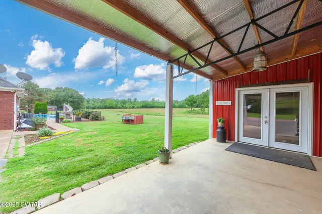 a view of a porch with a yard