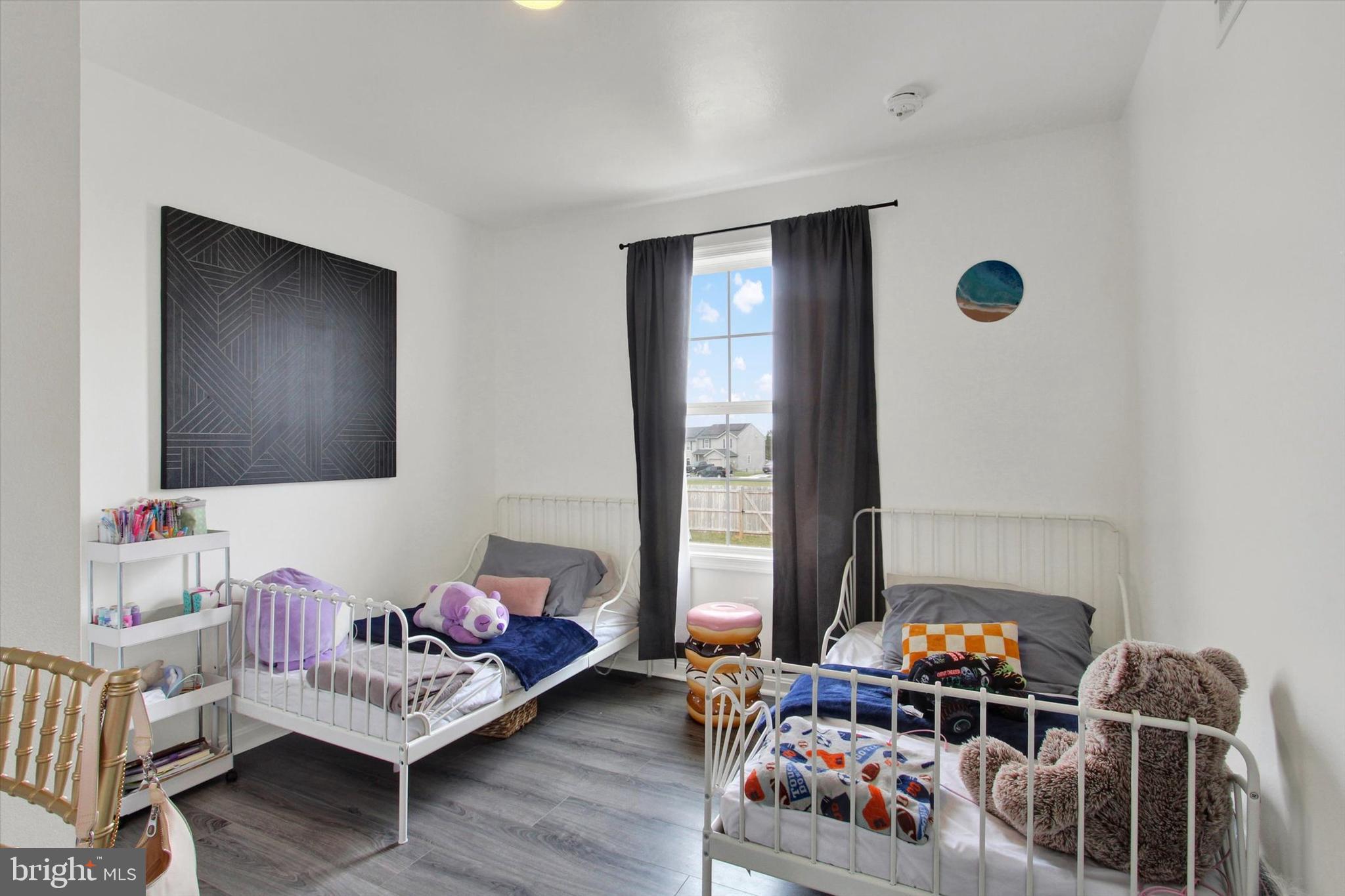 80 Galaxy Drive Hanover, PA 17331 - Photo 16 of 26 a bedroom with furniture and a window