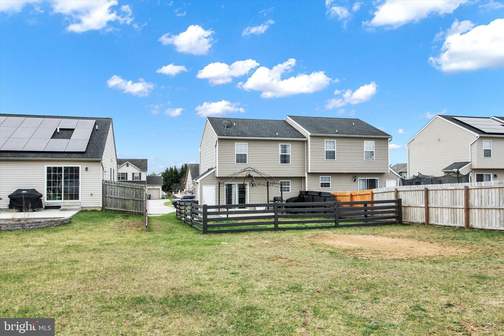 80 Galaxy Drive Hanover, PA 17331 - Photo 24 of 26 a view of a house with swimming pool and sitting area