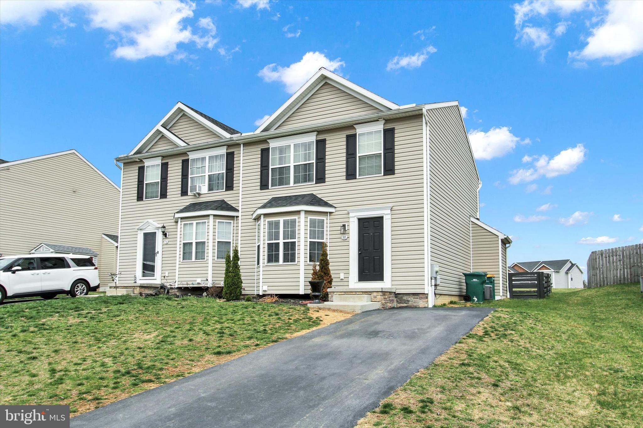 80 Galaxy Drive Hanover, PA 17331 - Photo 26 of 26 a front view of a house with a yard and trees