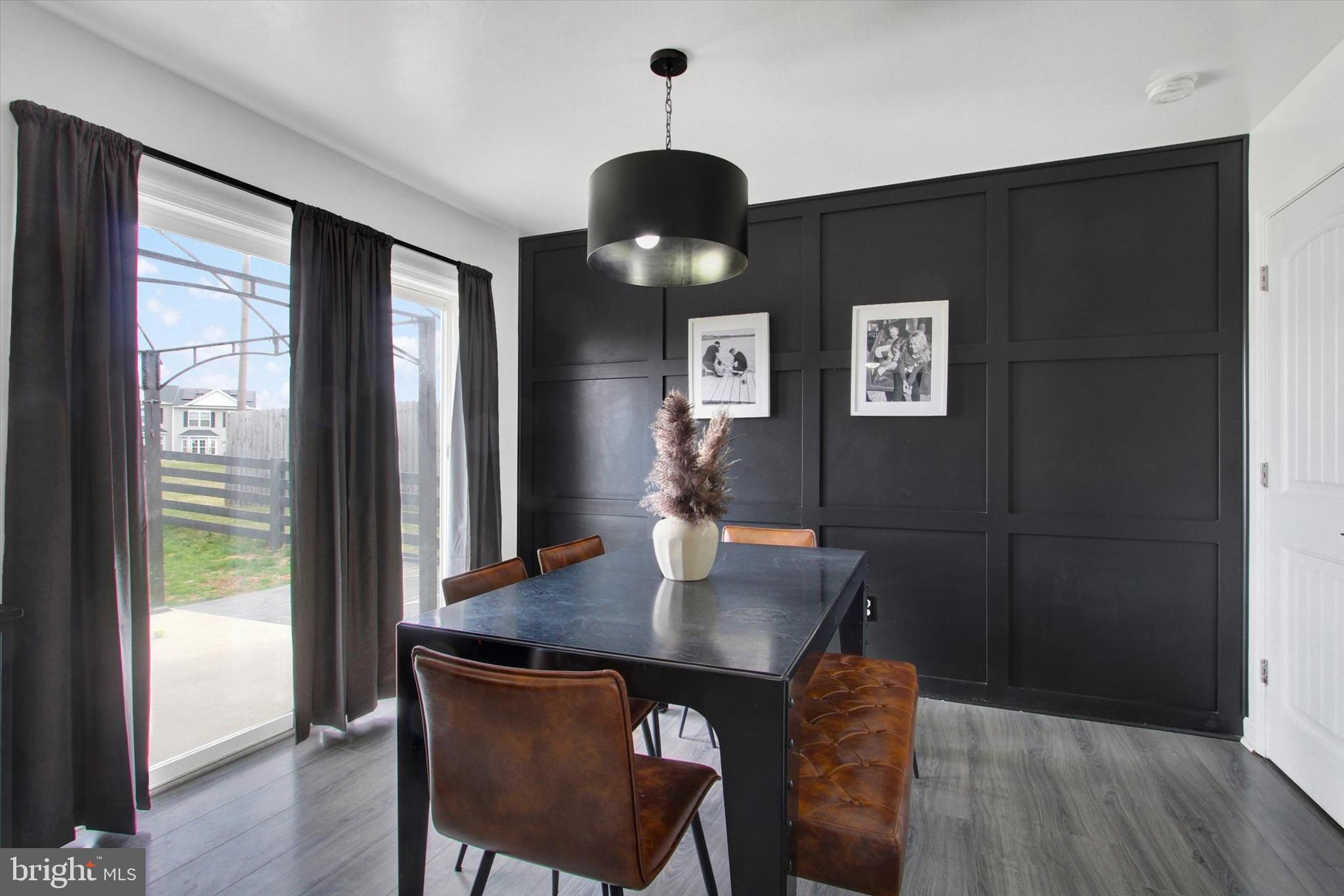 80 Galaxy Drive Hanover, PA 17331 - Photo 5 of 26 a view of a dining room with furniture window and wooden floor