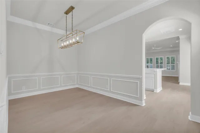 a view of an empty room with a glass door