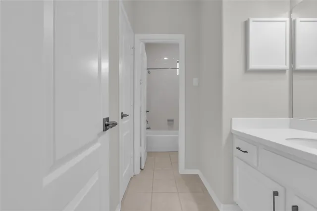 a bathroom with a sink and a vanity