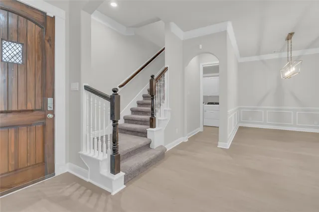 a view of an entryway with stairs