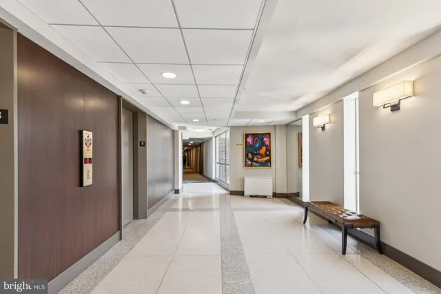 a view of a hallway with workspace