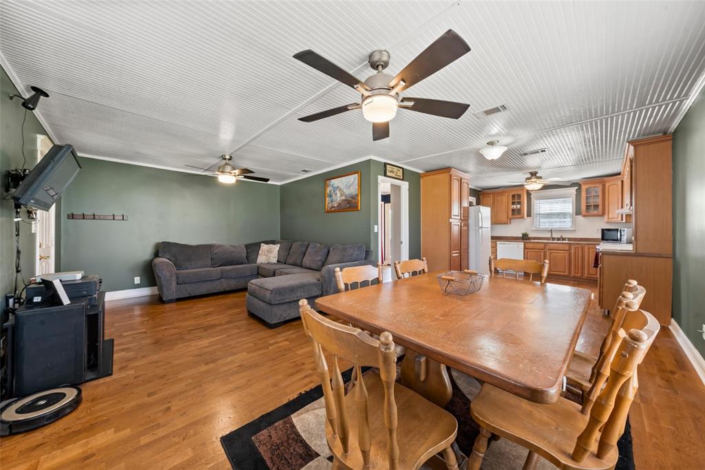 710 South Old Temple Road Lorena, TX 76655 - Photo 4 of 19 Dining space featuring light wood-style floors and a ceiling fan