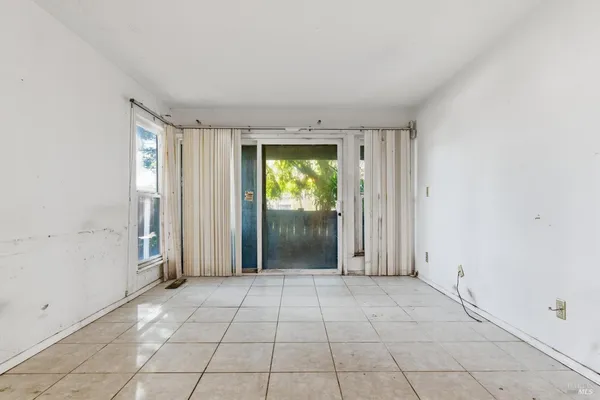 a view of an empty room with window