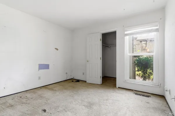 an empty room with windows