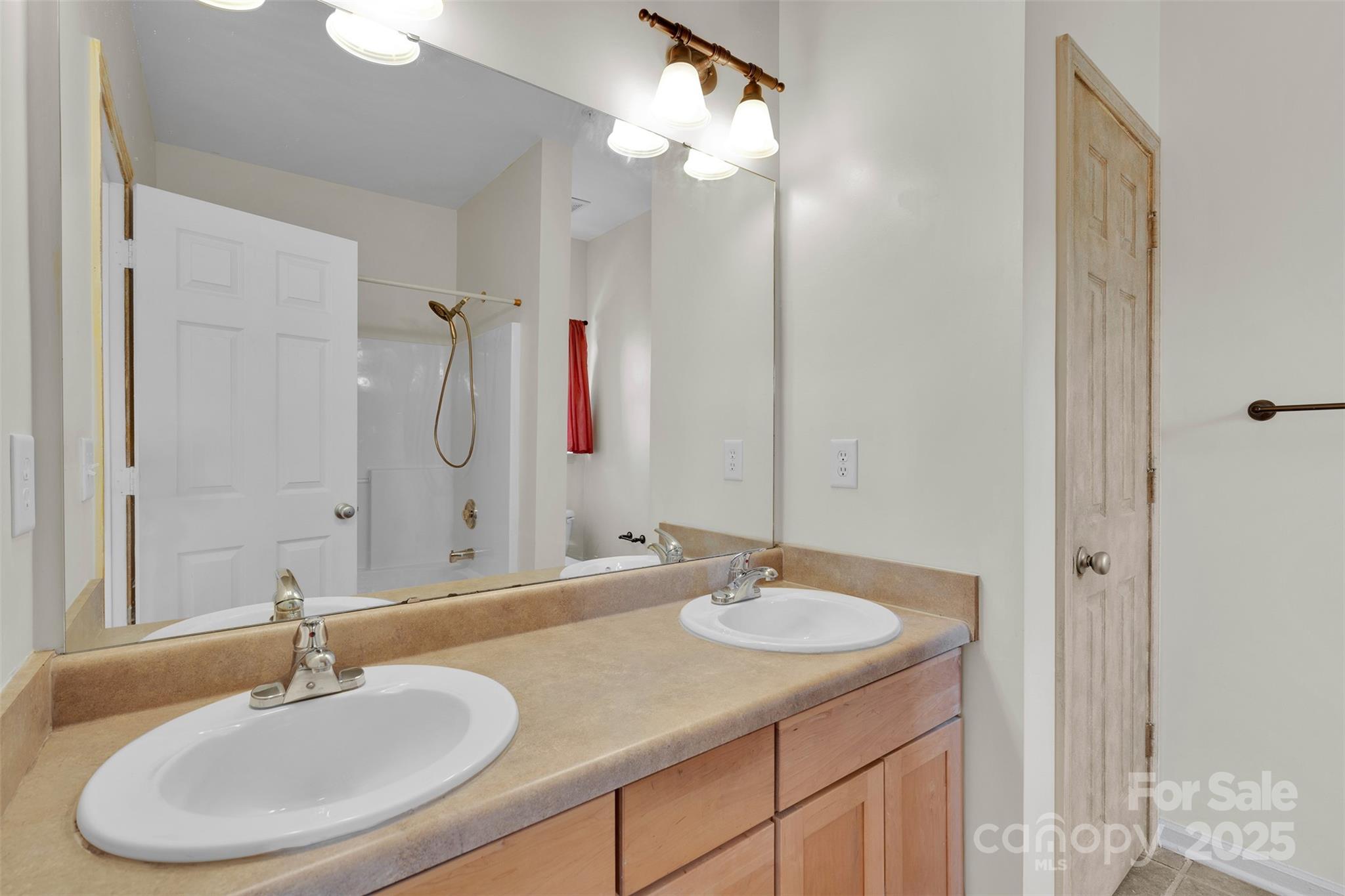 649 Raphael Place Charlotte, NC 28205 - Photo 20 of 47 a bathroom with a sink and a mirror