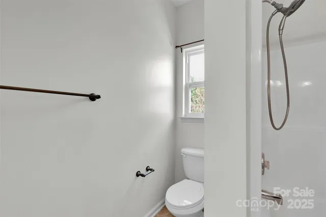 a kitchen with a cabinets and window