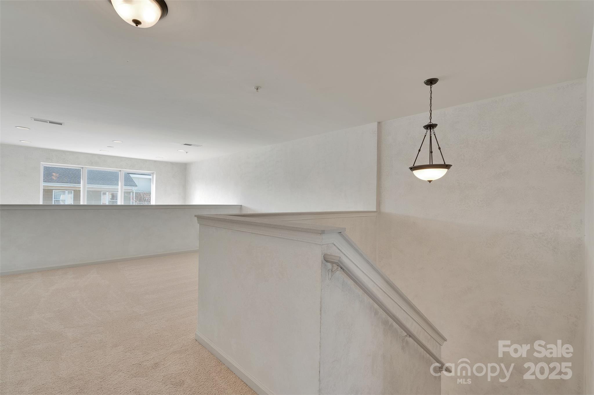 649 Raphael Place Charlotte, NC 28205 - Photo 23 of 47 a kitchen with a cabinets and window