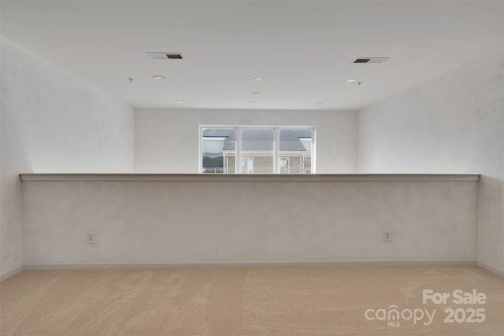 649 Raphael Place Charlotte, NC 28205 - Photo 24 of 47 a view of an empty room with a window