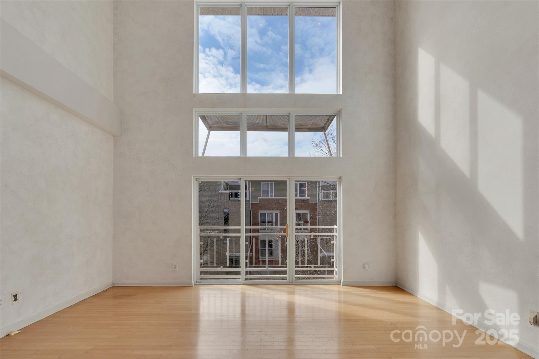 649 Raphael Place Charlotte, NC 28205 - Photo 3 of 47 a view of an empty room with a window