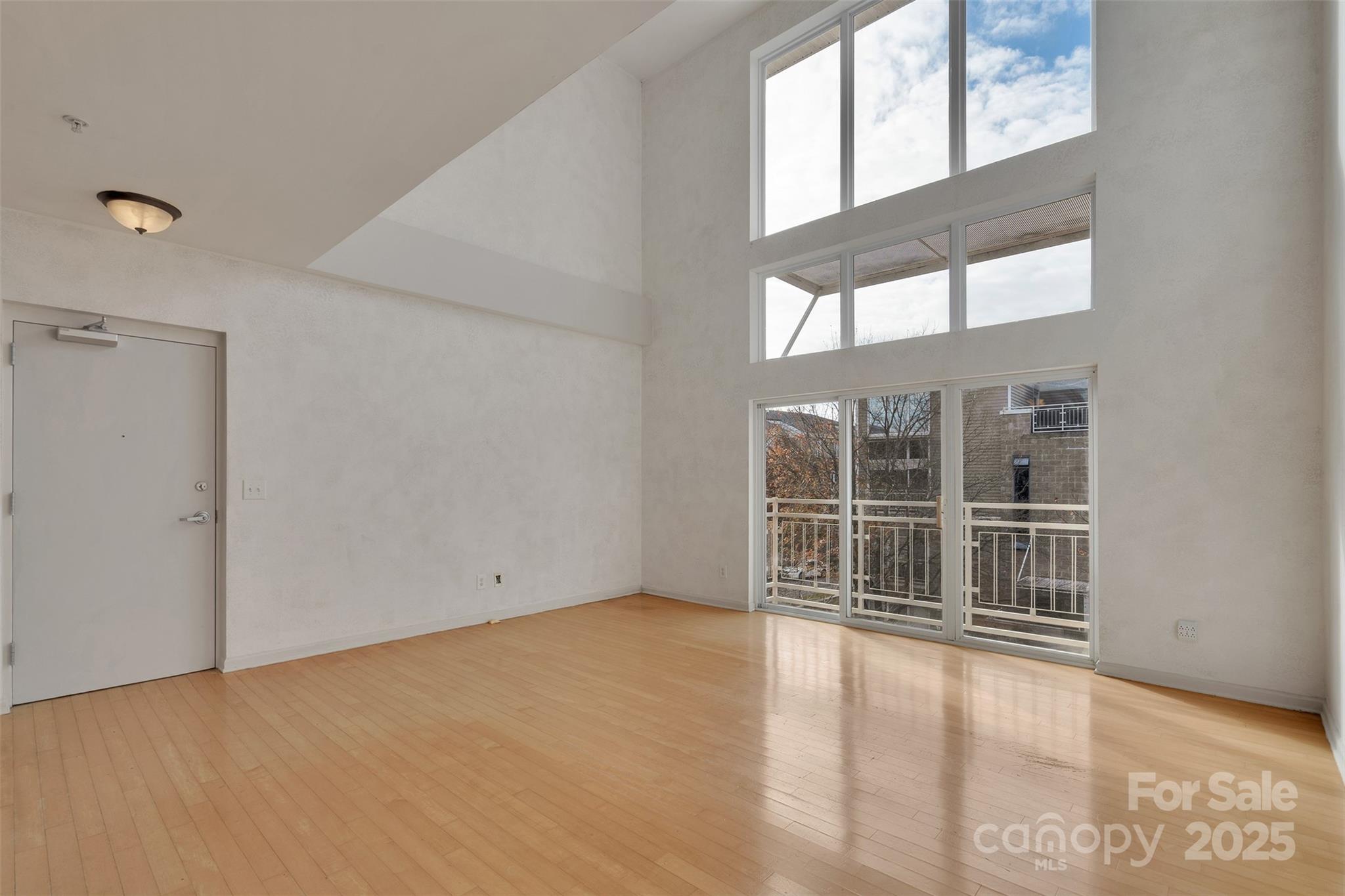 649 Raphael Place Charlotte, NC 28205 - Photo 4 of 47 an empty room with windows