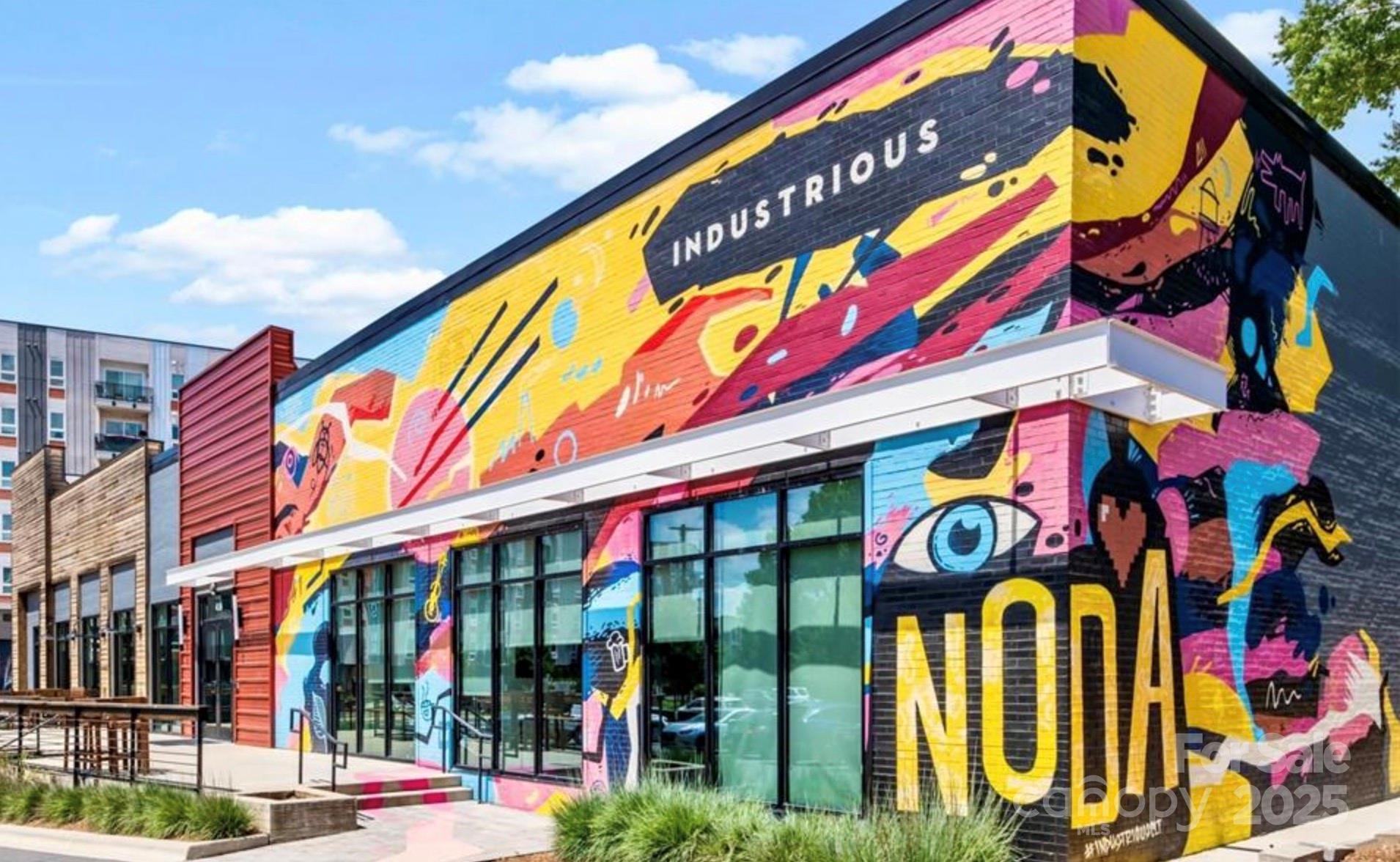 649 Raphael Place Charlotte, NC 28205 - Photo 41 of 47 a view of a building with umbrellas