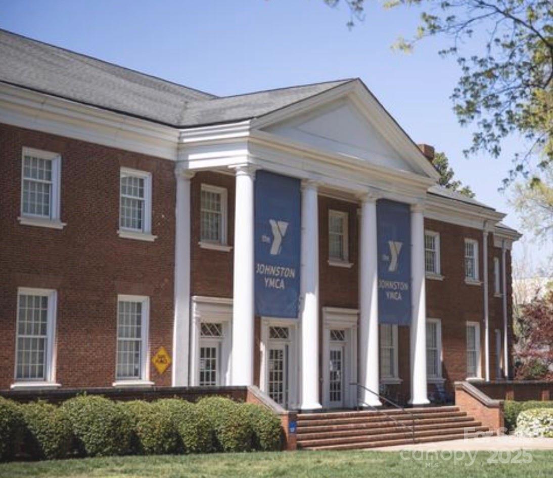 649 Raphael Place Charlotte, NC 28205 - Photo 44 of 47 a view of a brick house with many windows