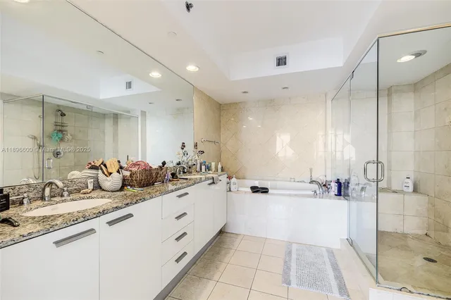 a bedroom with a bed and a table